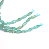 Green Fluorite Faceted Rice Beads AAA Grade Size- 9x21 MM Length-16 Inch 1 Strand Weight 318 Cts